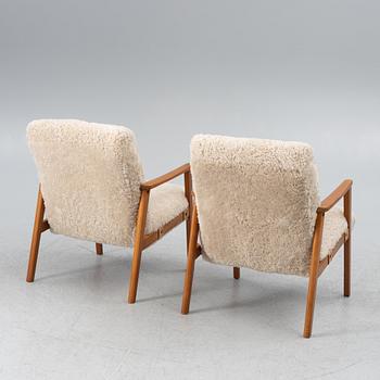 A pair of armchairs, mid-20th century.