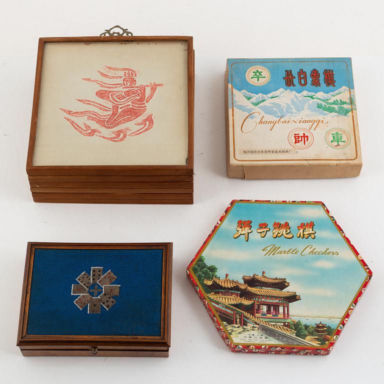 A set of six Chinese ink rubbings, two board games and a box with glass pearl embroidery.