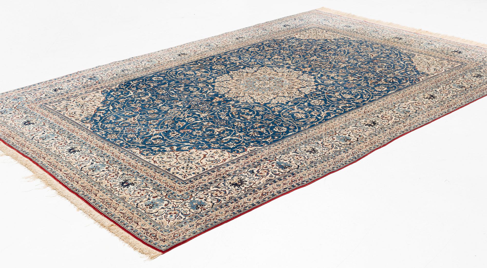 A semi-antique Nain Tusheshk, signed, ca 324 x 223 cm.