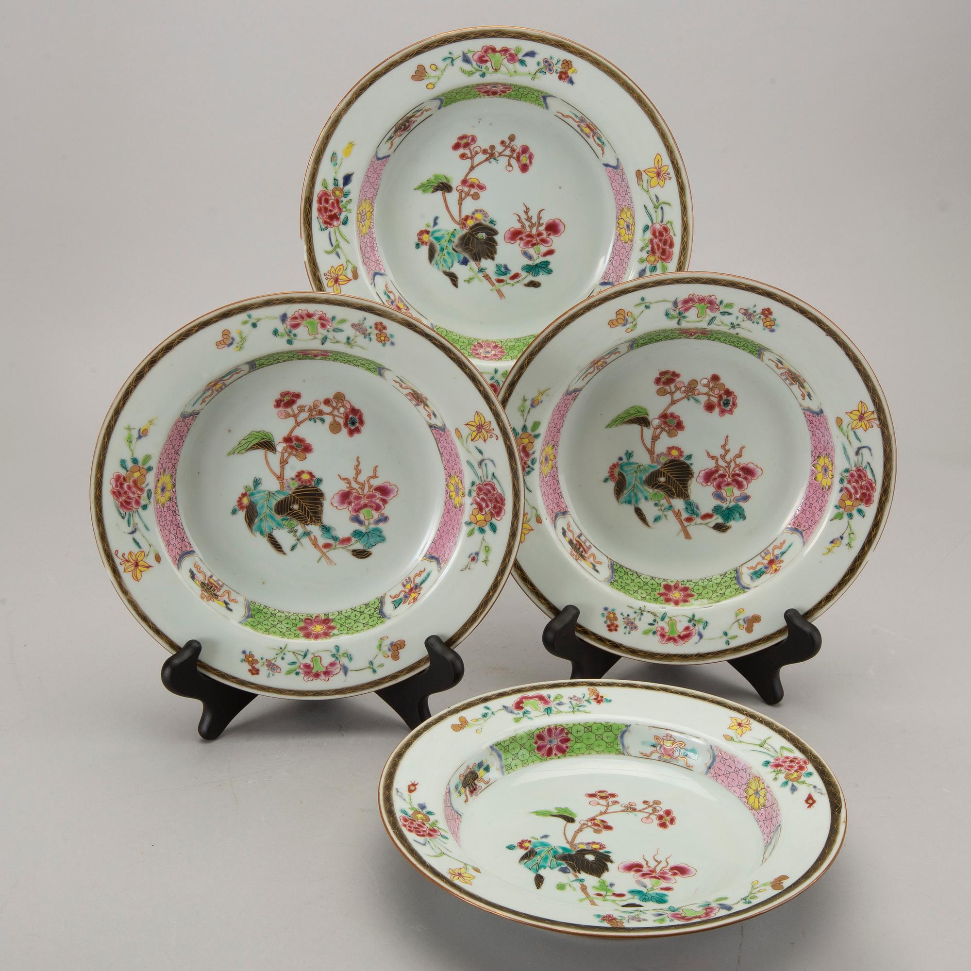 A set of four Chinese famille rose Qianlong porcelain plates.