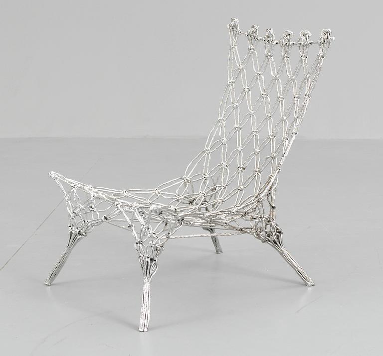 A Marcel Wanders 'Knotted Chair' made of macramé knotted carbon and aramide fiber cord by Cappellini, Italy.