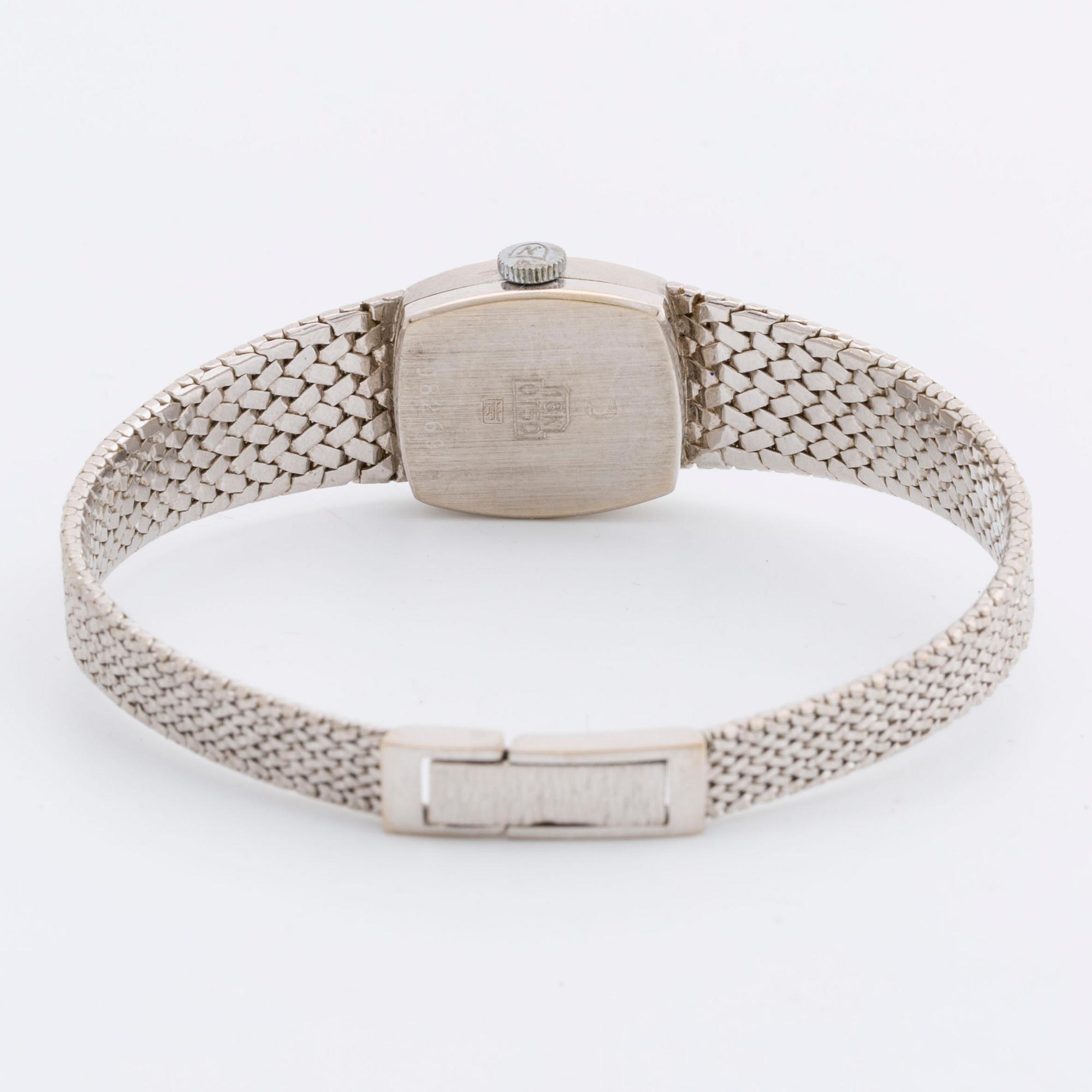 DAMARBANDSUR MOWADO, 18K vitguld, 15 x 17 mm, manuellt verk.