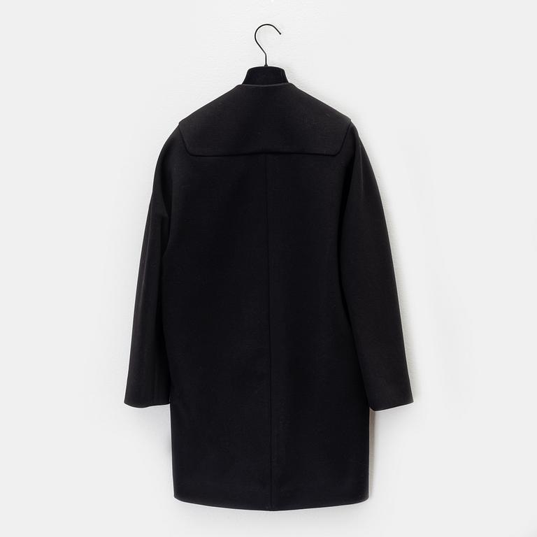 Balenciaga, a black coat, size 36.