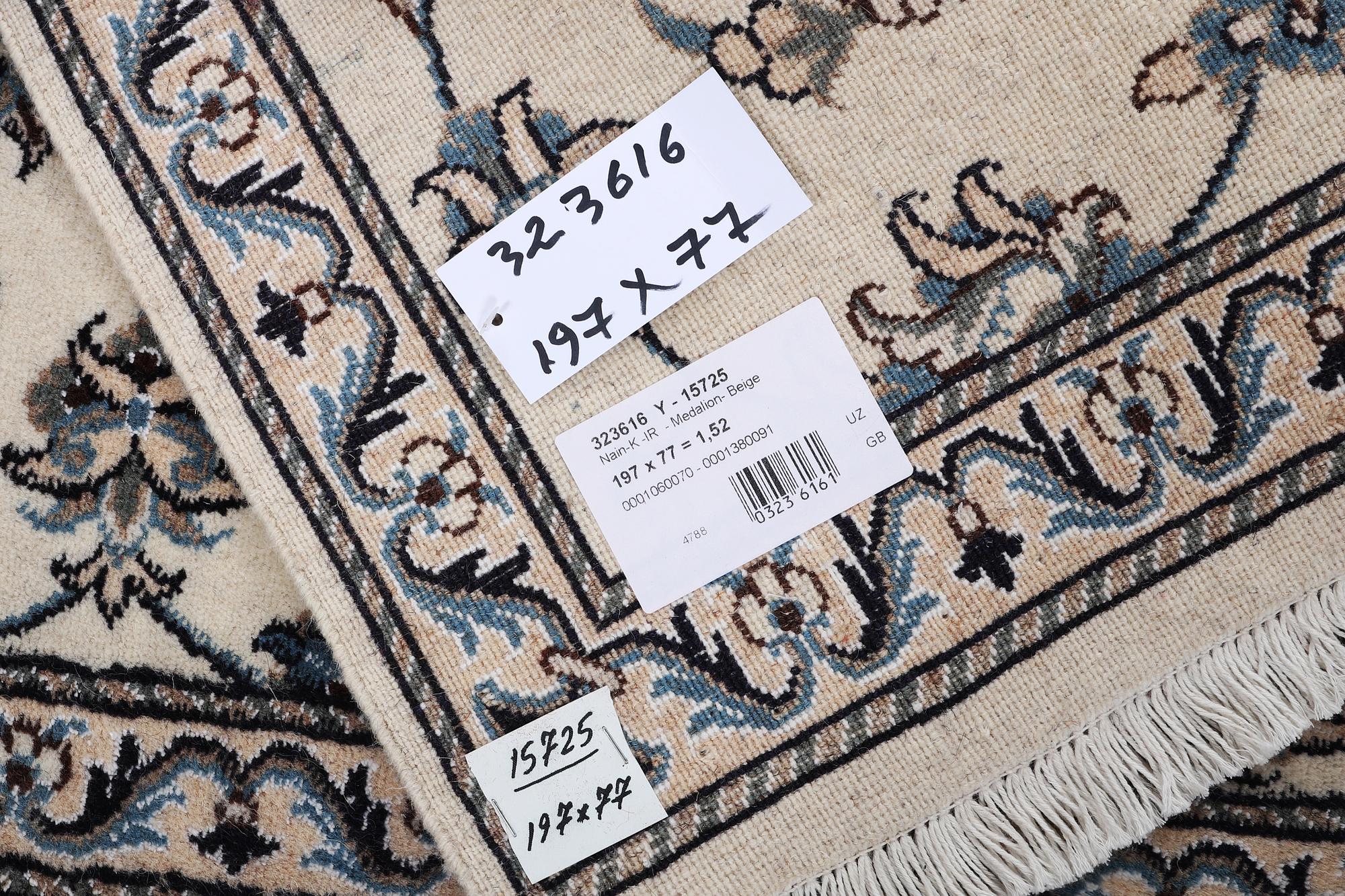 A runner carpet, Nain, part silk, ca 197 x 77 cm.