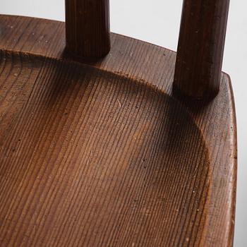 Axel Einar Hjorth, a set of four stained pine "Utö" chairs, Nordiska Kompaniet, Sweden, 1930s.