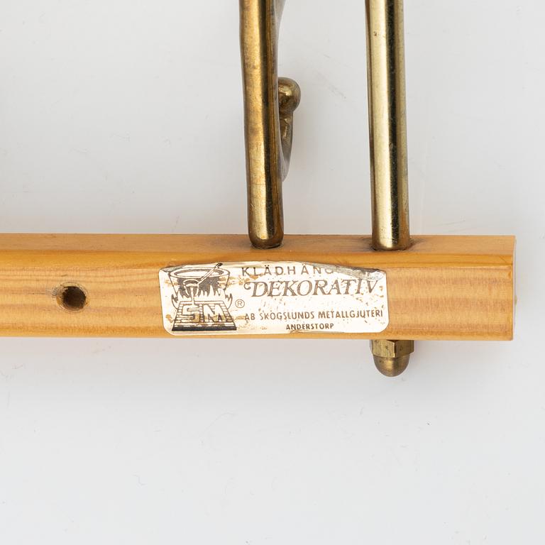 A group of three 'Dekorativ' coat hangers, Skoglunds metallgjuteri, Anderstorp, 1950's/60's.