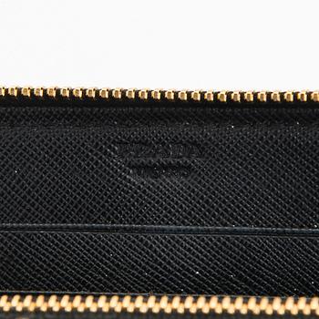 Prada, a wallet.