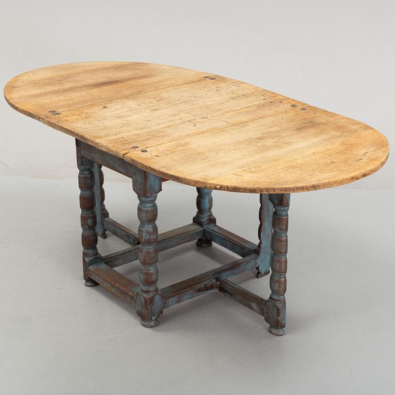 A 19th Century painted gate leg table.