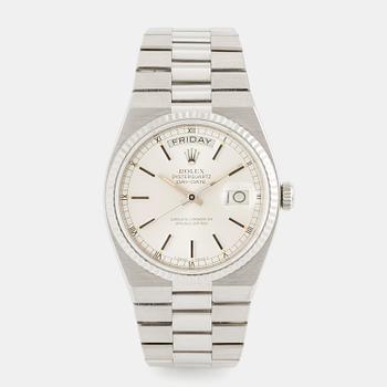 1095. Rolex, OysterQuartz, Day-Date, ca 1984.