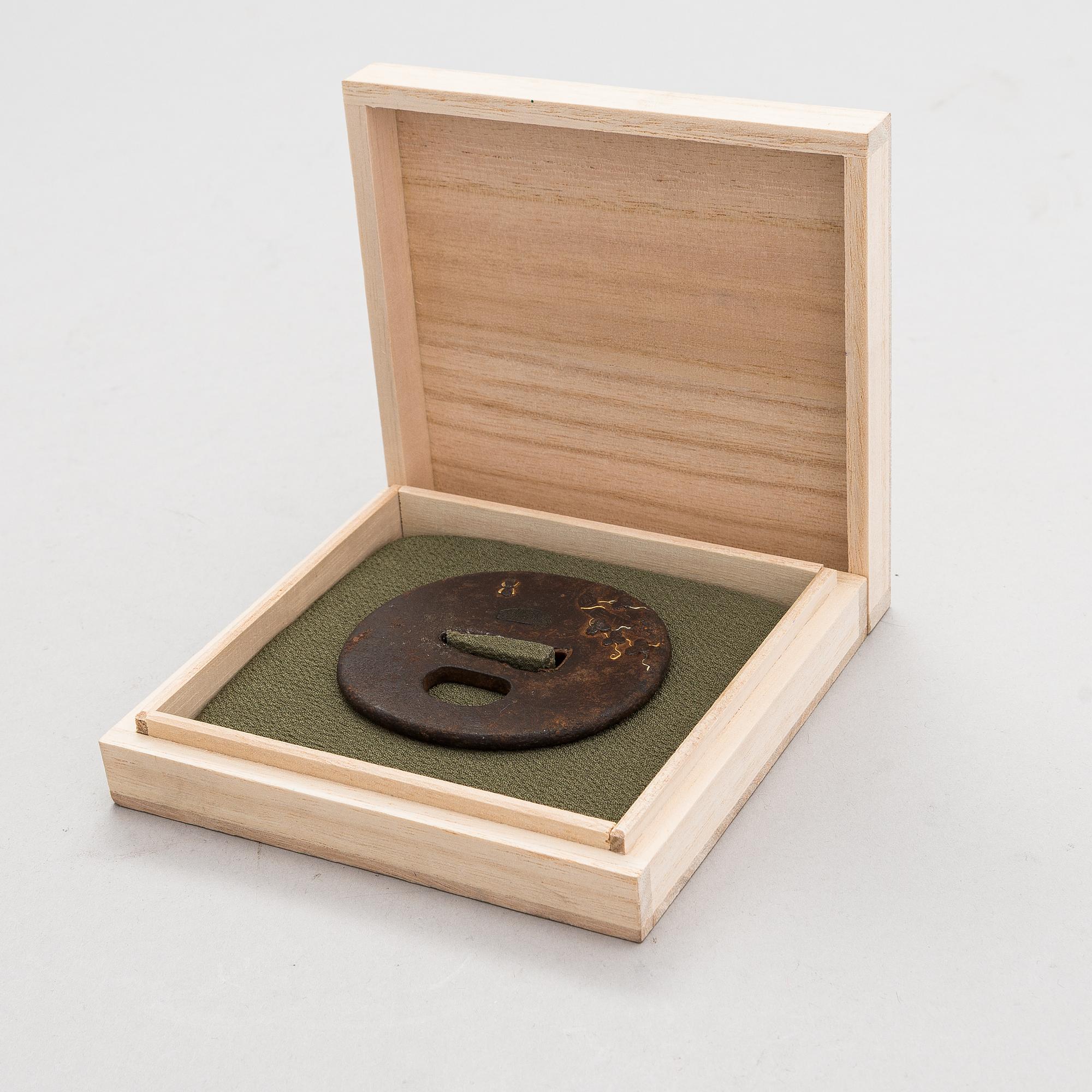 Japanese sword mountings, tsuba and tsuka.