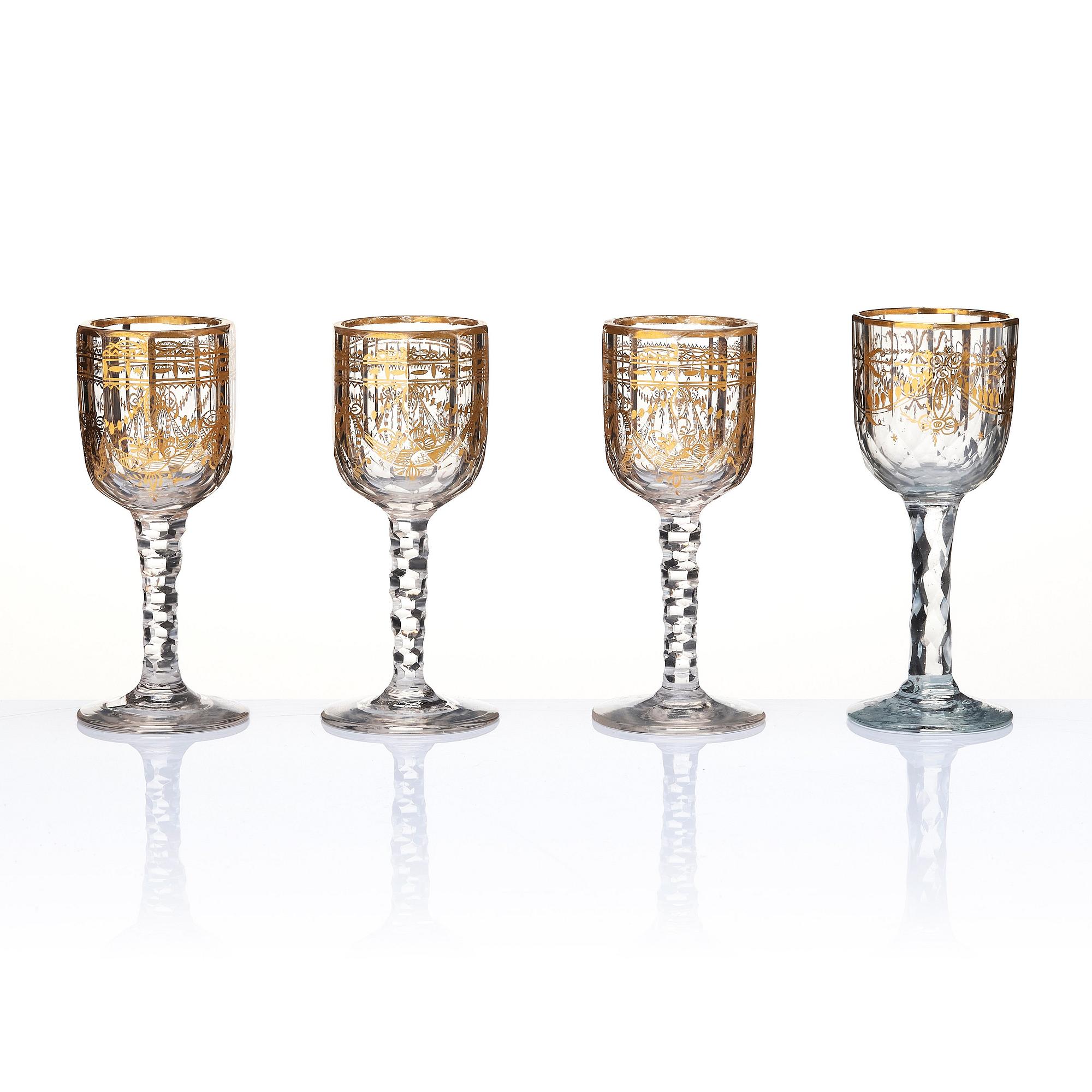 A set of seven cut and gilded glasses, 18th Century.