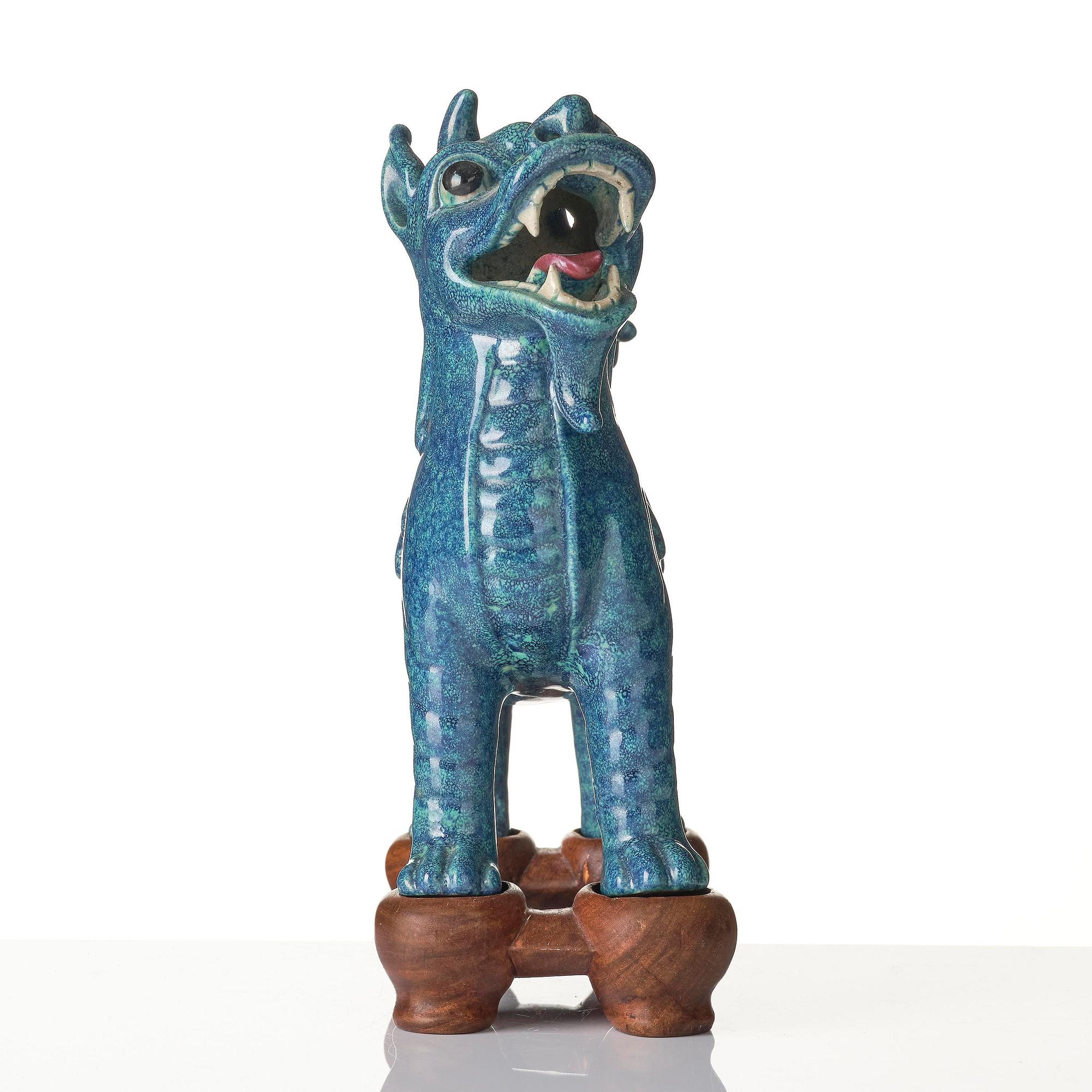 A turquoise/robins egg glazed figure of a buddhist lion, Qing dynasty, Jiaqing (1796-1820).