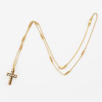 Pendant in the form of a cross with a chain, 14K gold with enamel and round brilliant-cut diamonds.