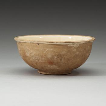 A marbled on white slip-glazed earthenware bowl, Song dynasty (960-1279).