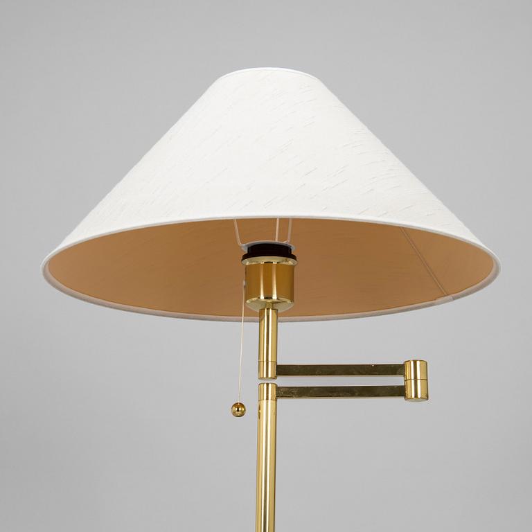 A 1970s/80s brass floor lamp, wall lamp and table lamp.