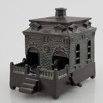 A mechanical bank, late 19th century, probably by Judd Manuf. Comp.