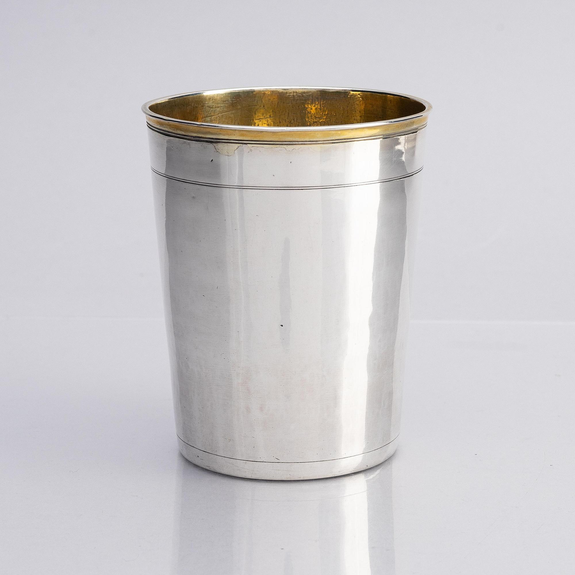 A German early 18th century, parcel-gilt silver beaker, unidentified maker, Augsburg 1701-1705.