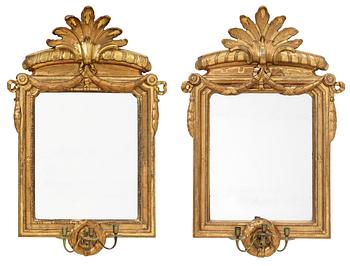 1001. A matched pair of Gustavian three-light girandole mirrors, by N. Sundström.