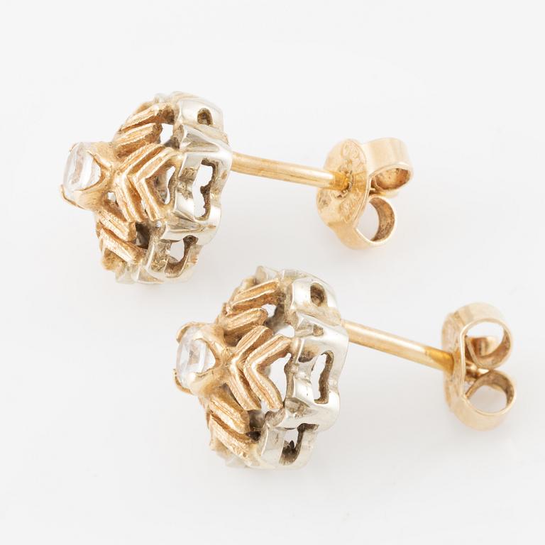 Earrings 18K gold with white stones.