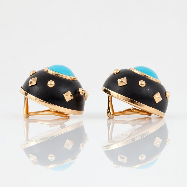 A pair of turquoise and wood earrings by Trianon. No: 27617.