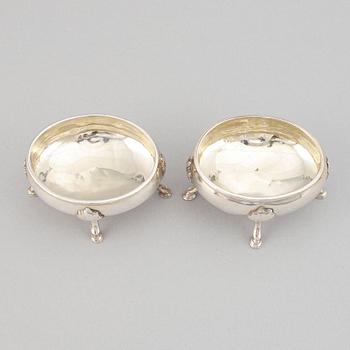 A pair of silver saltcellars, London, England.