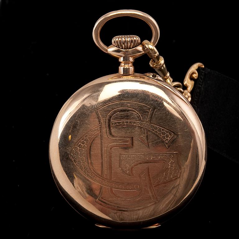 A POCKET WATCH WITH CHATELAINE.