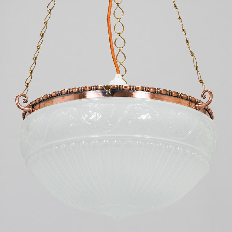 Kattovalaisin, 1900-luvun alku.