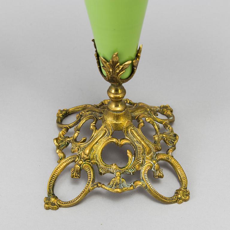 A pair of late 19th Century gilt candelabra.