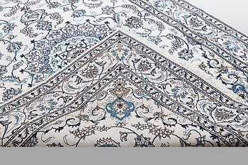 A carpet, Nain, 285 x 196 cm.