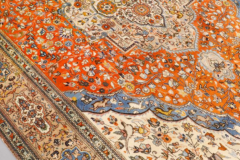 A carpet, Figural Tabriz so called Tabatabai, ca 390 x 268 cm.