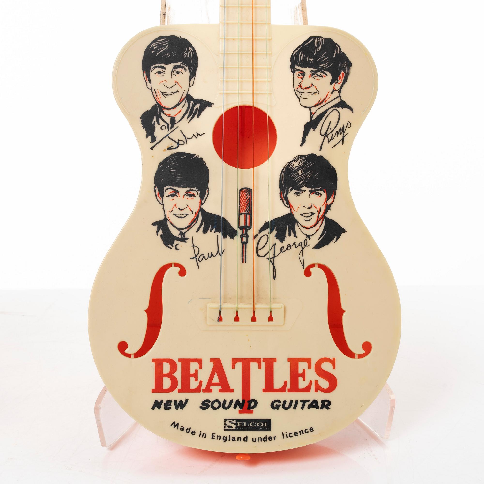 The Beatles, "New Sound Guitar", toy guitars, 2 pcs, Selcol Products Limited, England. 1960s.