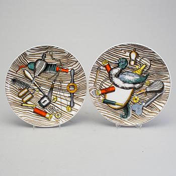 Six Fornasetti plates 'Oggetti Caccia' Milano, Italy, 1950's/60's.