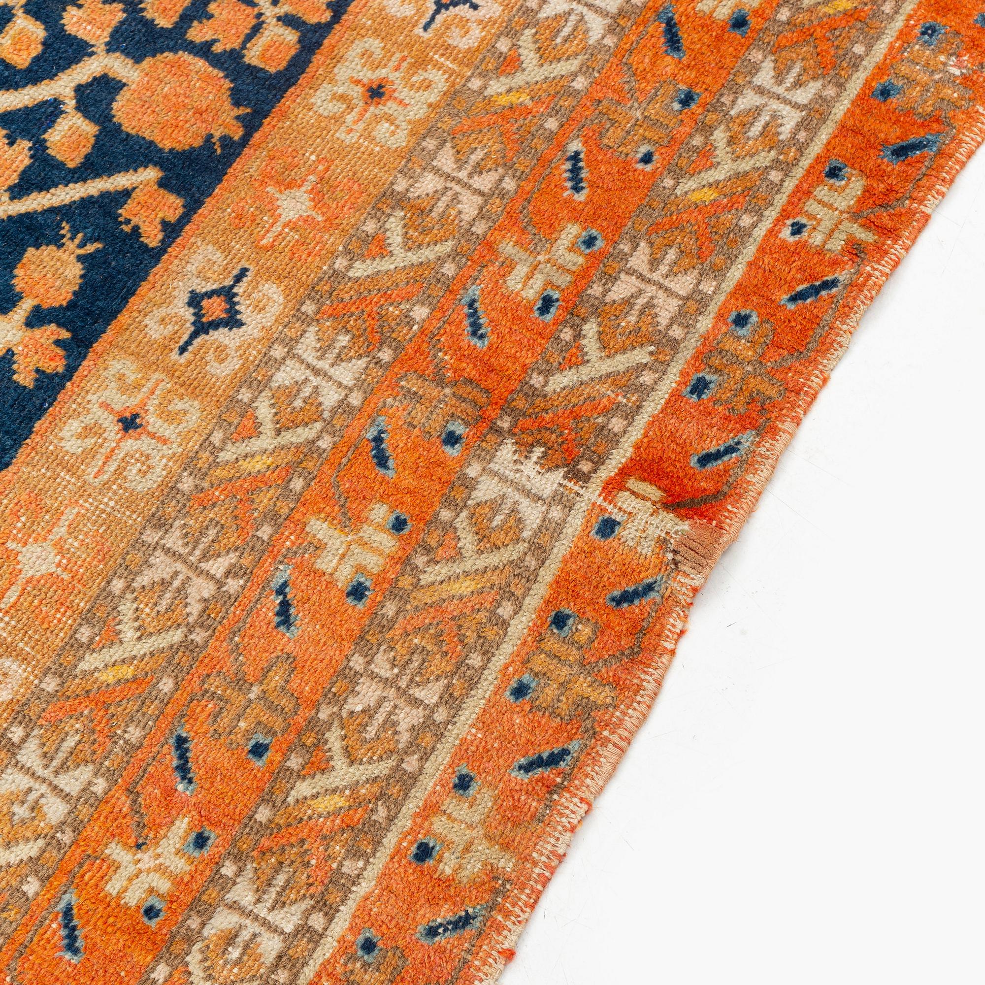 An antique Khotan carpet, Xinjiang area, China, ca 272 x 155 cm.