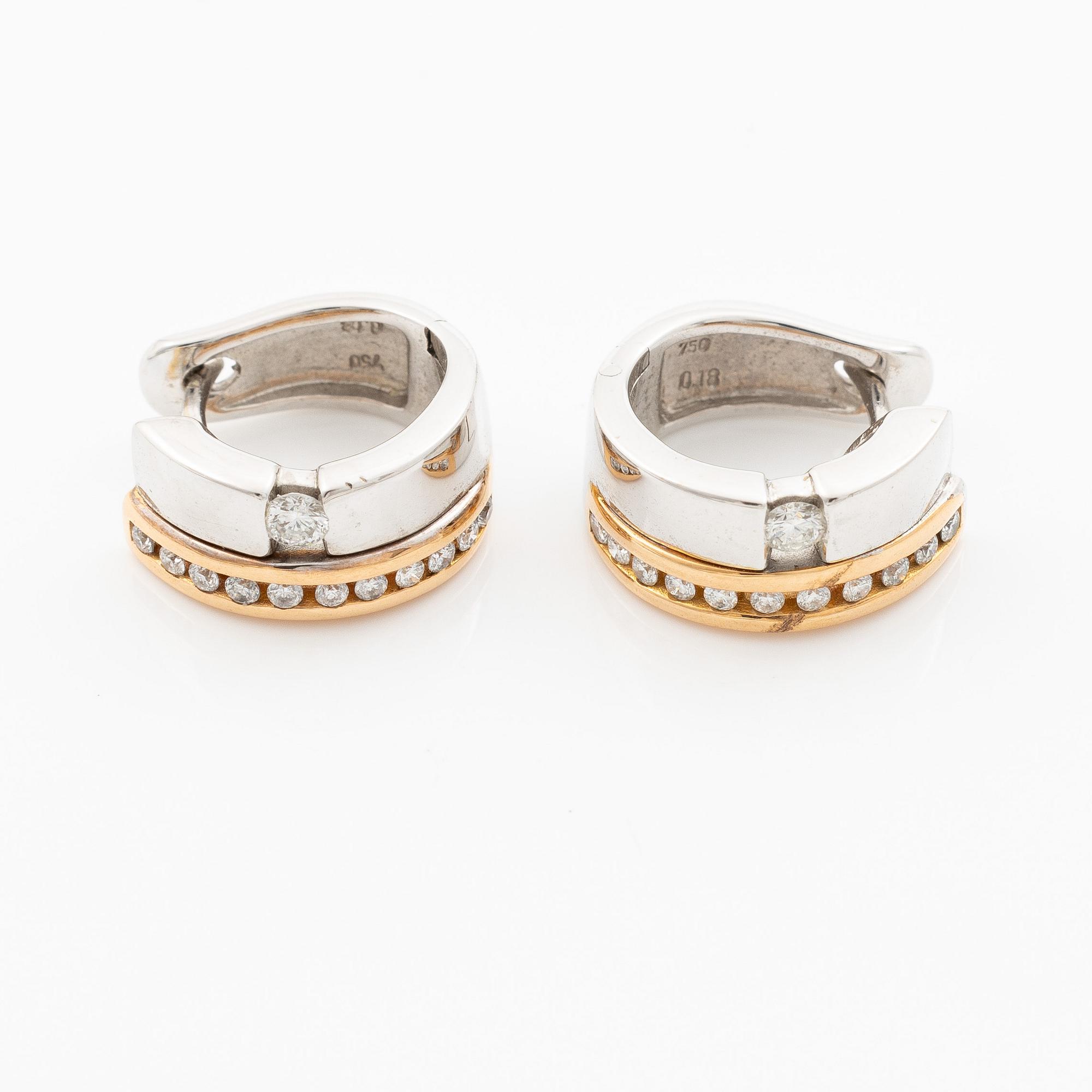 Örhängen, ett par 18K guld och vitguld med briljantslipade diamanter.