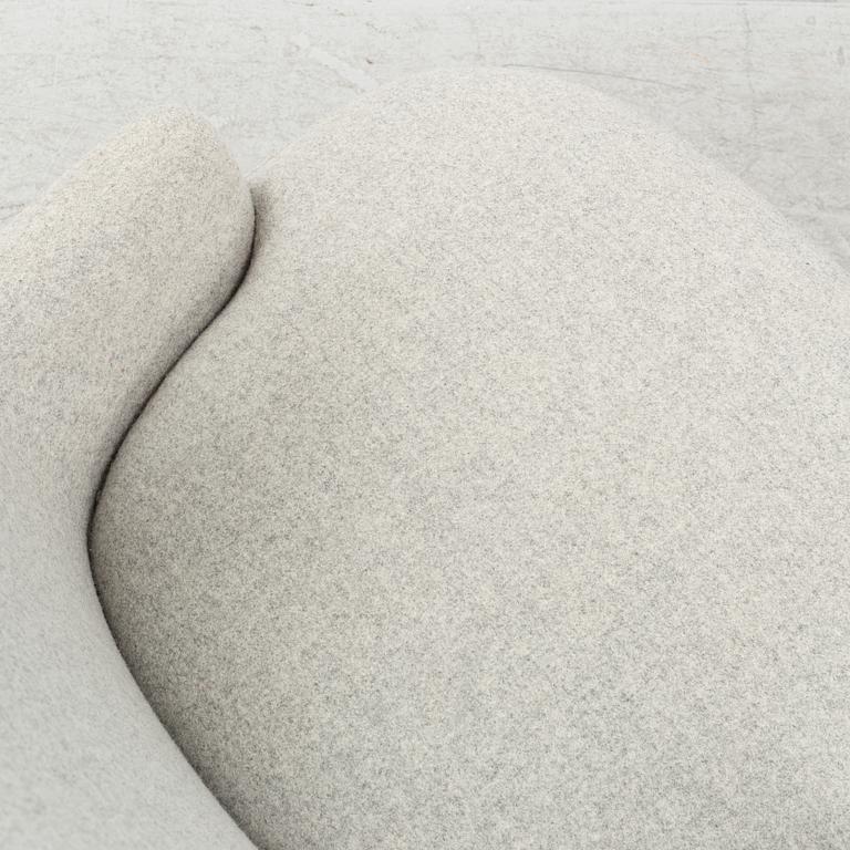 A 'Wingback Micro' easy chair by Tom Dixon.