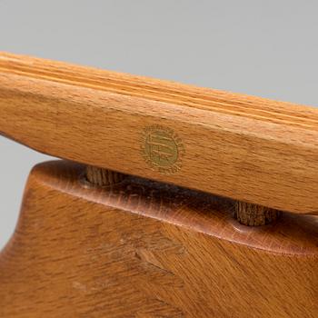 A late 20th century Fratelli Reguitti stand for men's clothes.