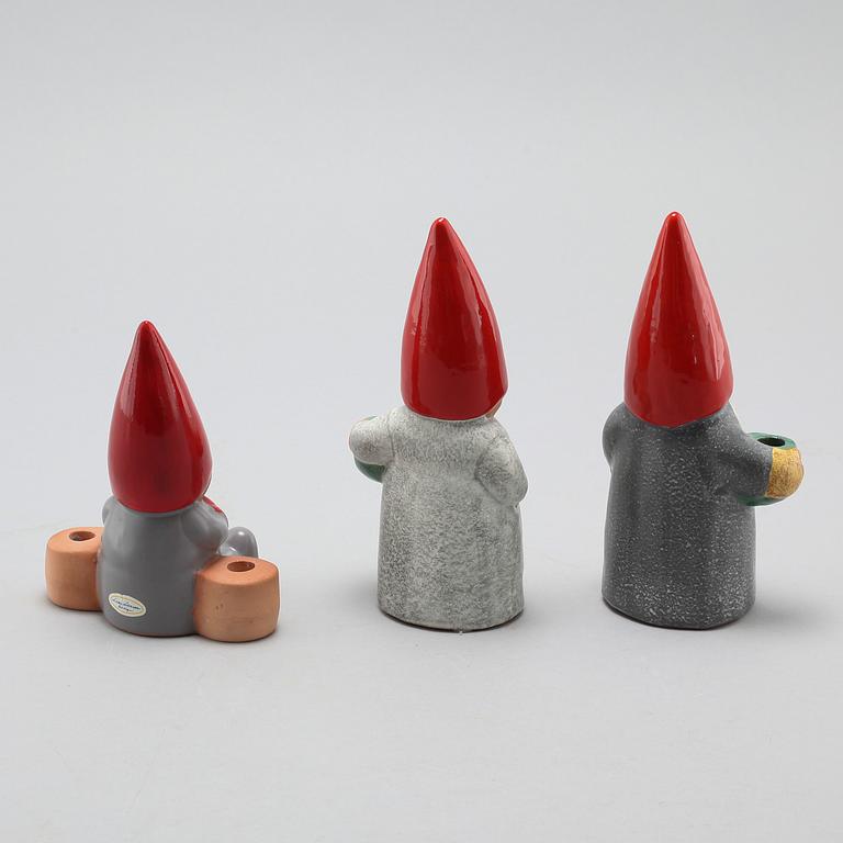 Three ceramic candlesticks by Lisa Larson for Gustavsberg, partly signed.