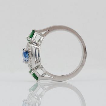 A sapphire, circa 1.30 cts, tsavorite garnet and diamond ring.