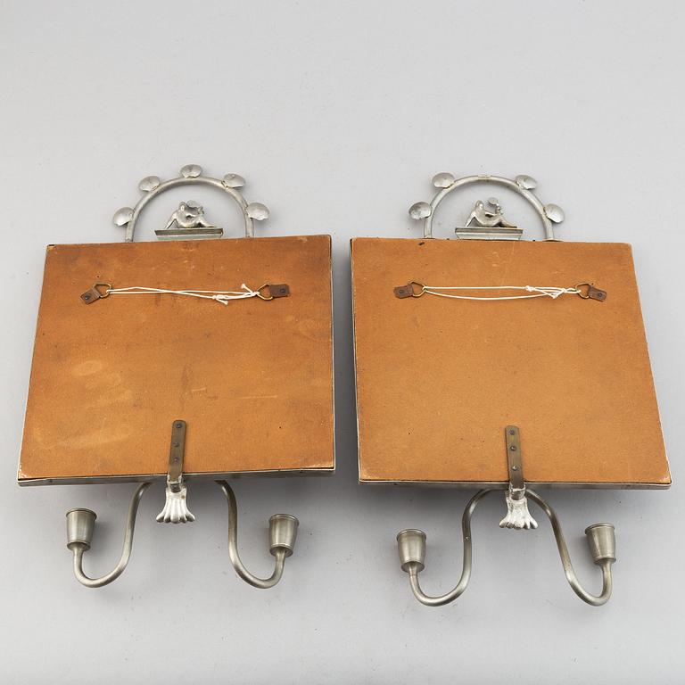 Two pewter wall sconces from Firma Svenskt Tenn, 1925.