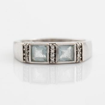 Ring, pendant, and a pair of earrings, 18K white gold with topaz and small diamonds.