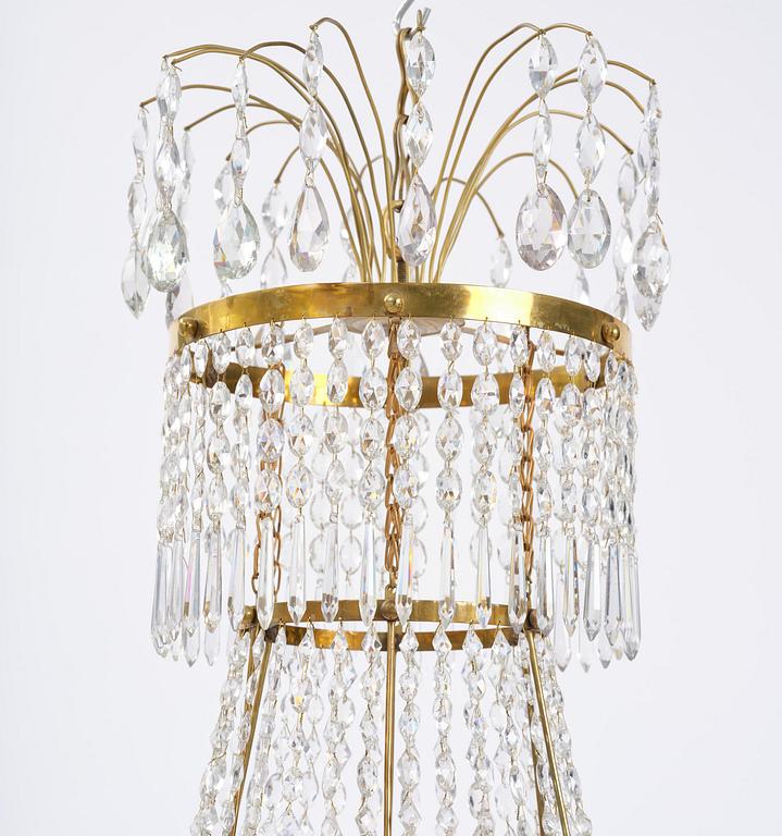 A late Gustavian gilt brass and cut glass seven-light chandelier, Stockholm, late 18th century.
