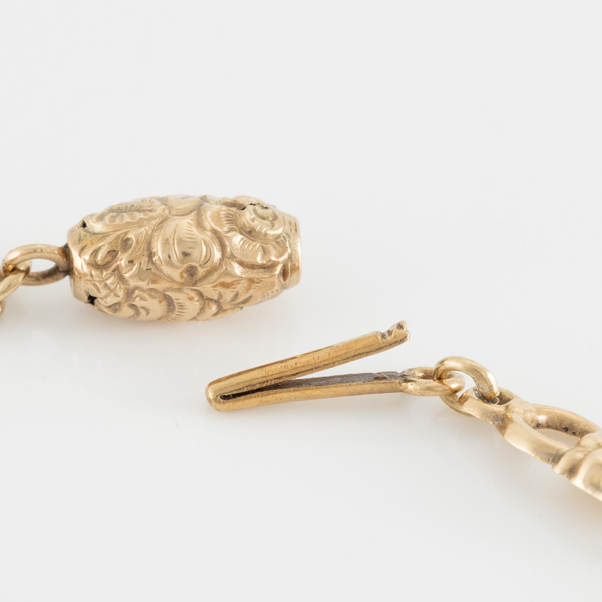 Necklace in 14K gold with carved coral. Probably around the turn of the century 1900.