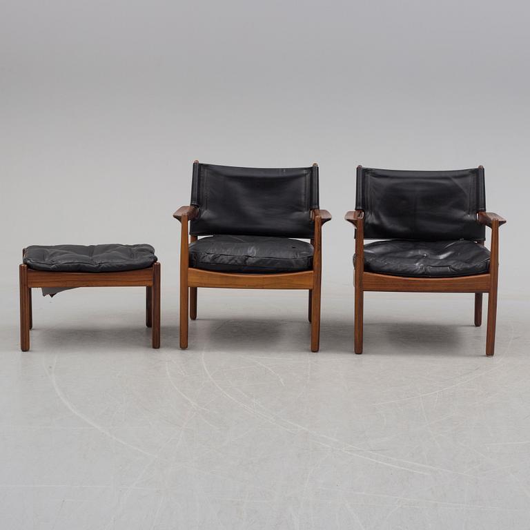 A pair of Gunnar Myrstrand 1960's armchairs and a stool. Cites.