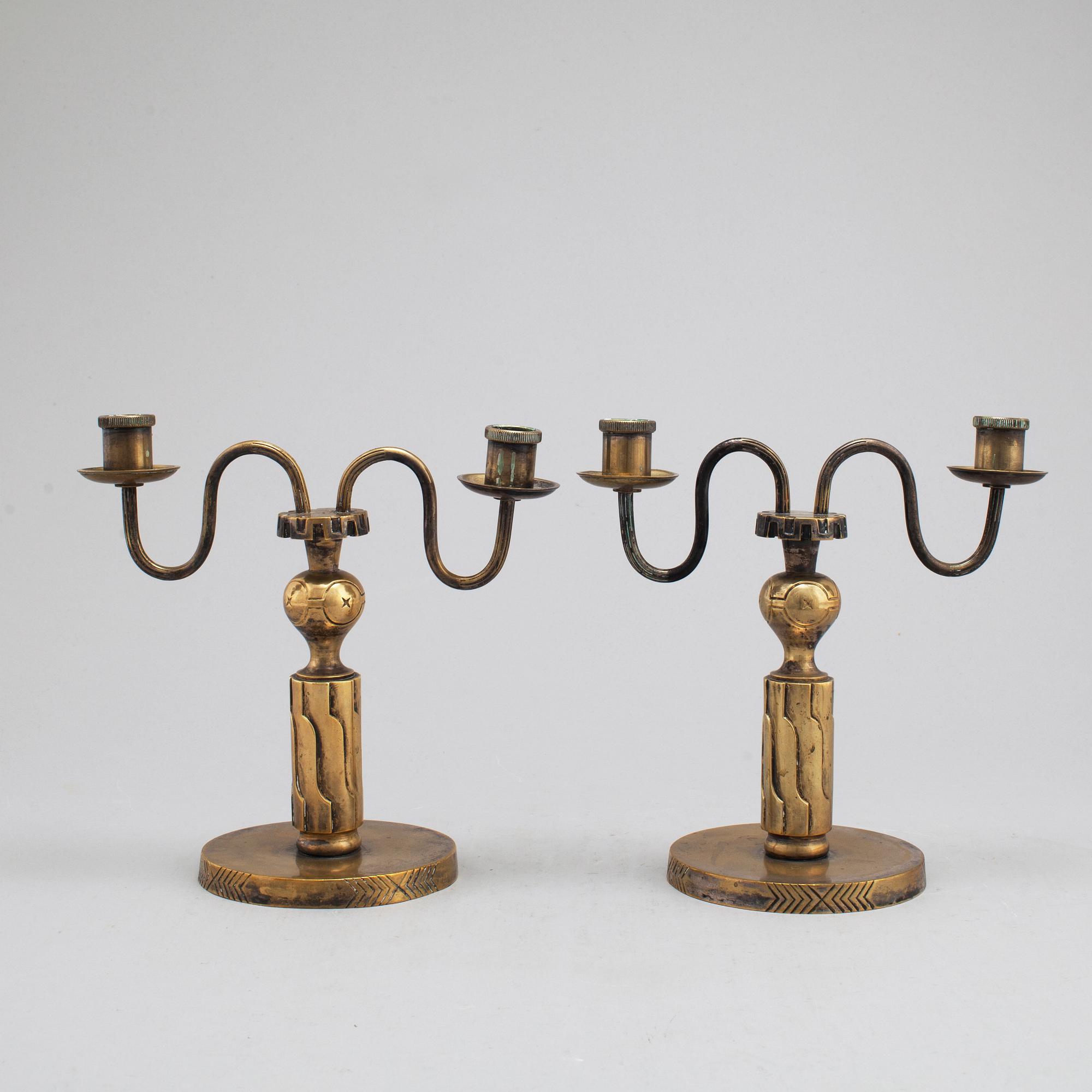 A pair of bronze candelabra, marked H. Bergman, 1920's/30's.