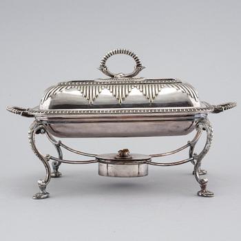 A silvered metal serving dish with rechaud, first half of the 20th century.