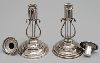 LJUSSTAKAR, ett par, silver, empire, Carl Fredrik Lilja, Karlskrona, 1820.