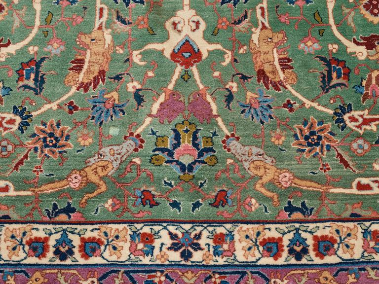 A carpet, a semi-antique Tabriz, ca 374-376,5 x 268-276 cm.