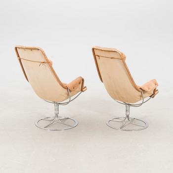 Bruno Mathsson, a pair of "Jetson" armchairs, Dux, second half of the 20th century.