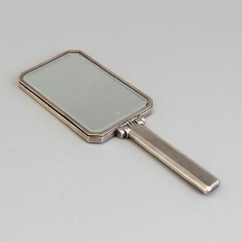 A 1920s / 30s Art Deco silver hand mirror.