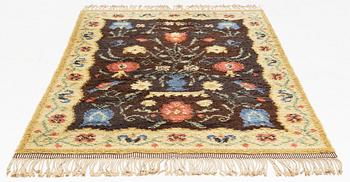 A rug, c. 235 x 155 cm.